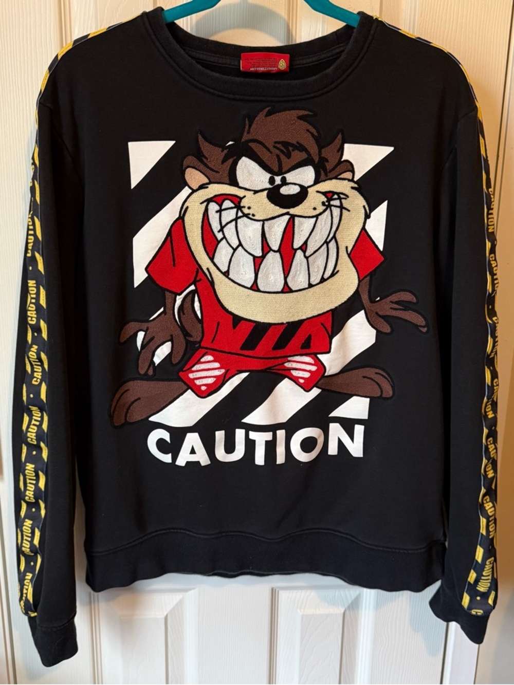 Warner Bros. Black Crewneck Sweater with Taz Graphic and Yellow Tape Trim Size L